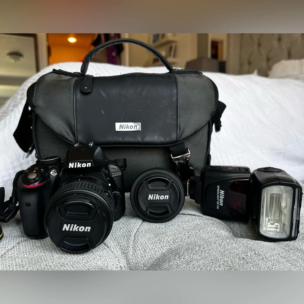Nikon d3300 DSLR camera, 2 lenses, speed light flash and case-- all included